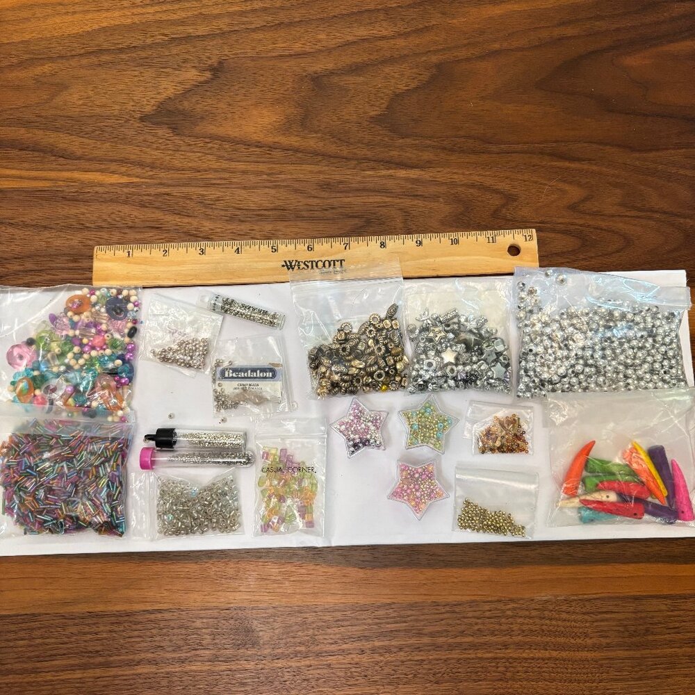 Lot of beads of various kinds, and beading tray